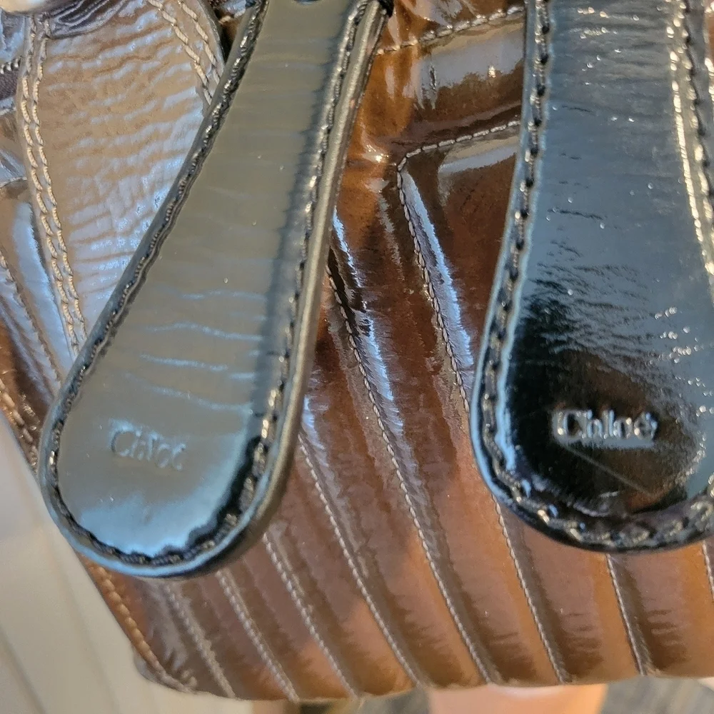 Chloe Bay Quilted Patent Leather Satchel Bag.